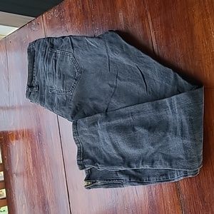 Black skinny jeans. Stretchy and comfy.  Zip detail on ankles. 5 pockets